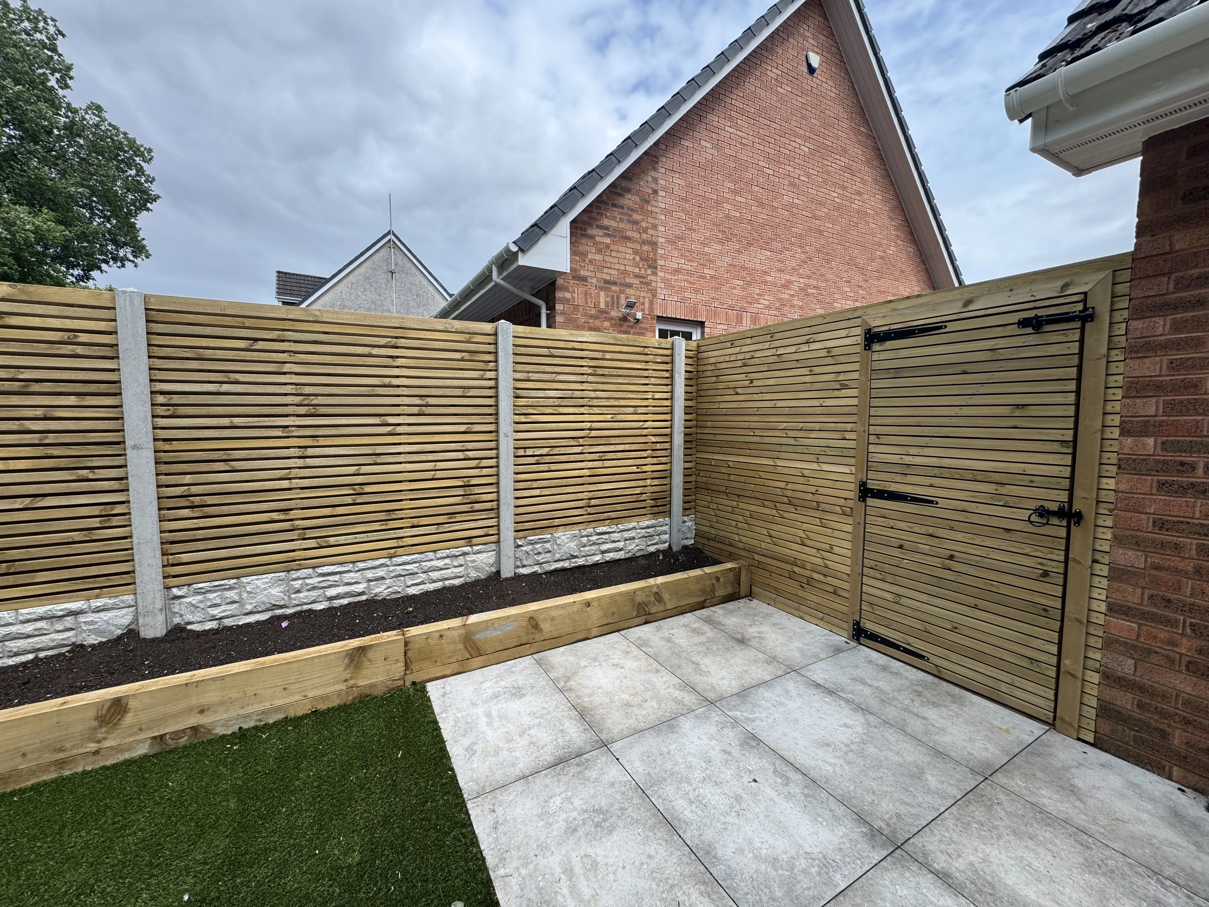 Professional wooden gate and fencing installation completed by Glasgow Fencing Contractors in Greater Glasgow